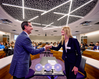 Student practicing consultative sales skills at a TCU Sales Center competition