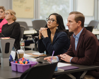 Executive Education participants learning about AI in the workplace