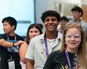 High school students learning TCU Riff Ram Bah Zoo chant during Analytics Academy