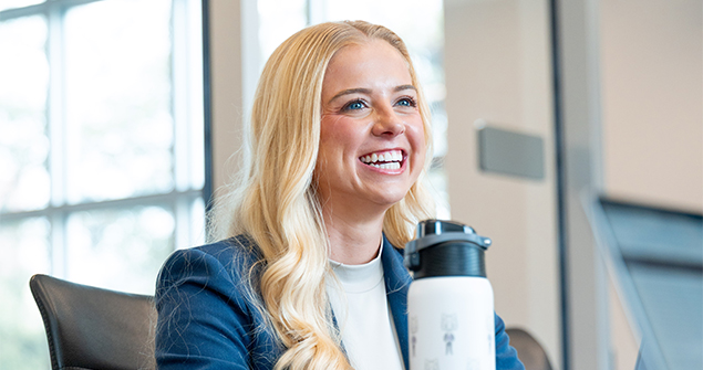 Portrait of a graduate student smiling