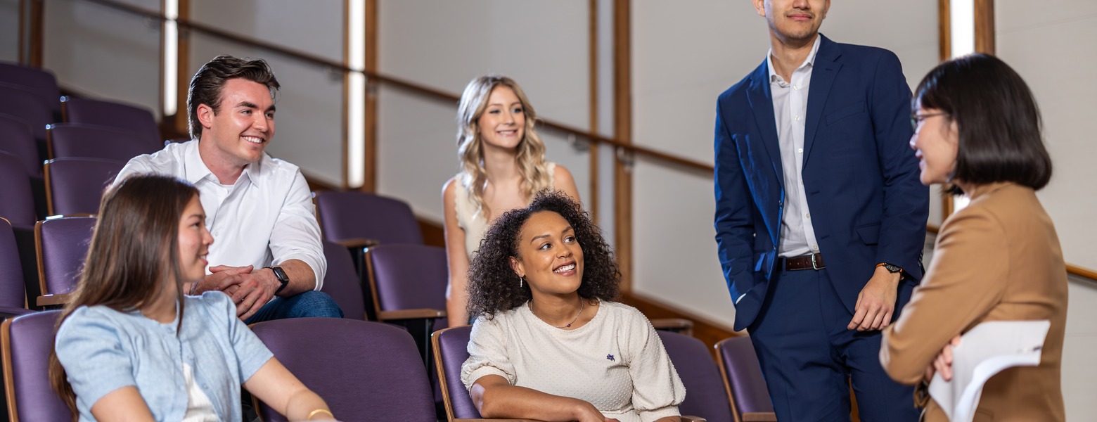 group meeting in a lecture hall on campus