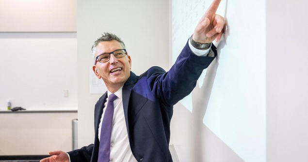 TCU professor enthusiastically teaching class