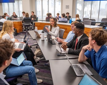 Students having a discussion in class