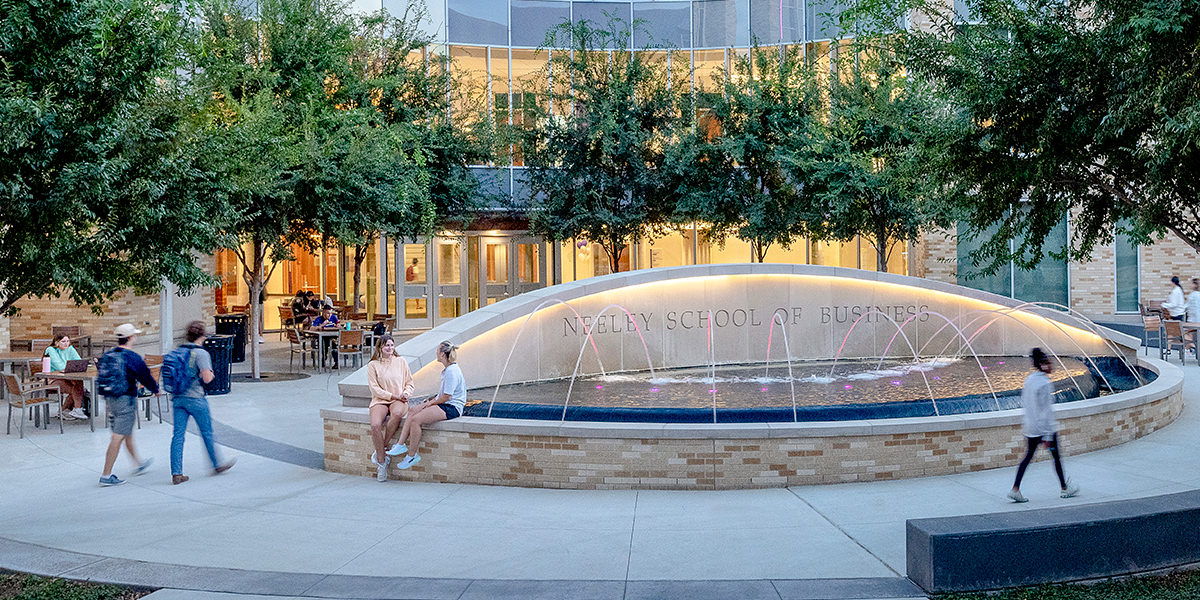 Neeley fountain with students