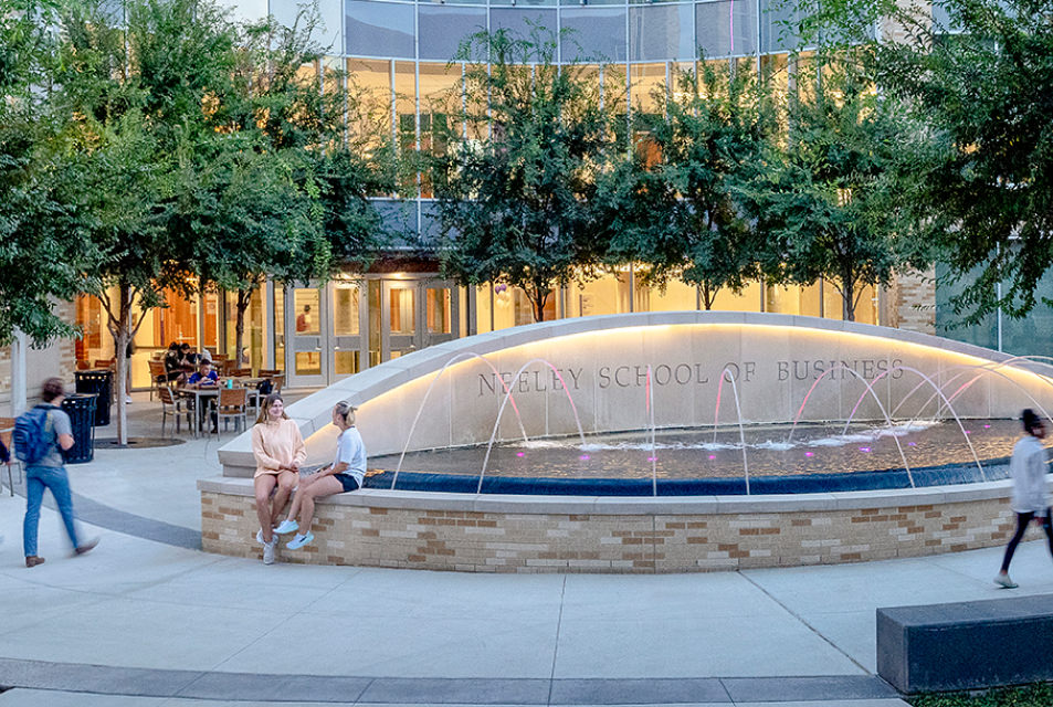 Neeley fountain with students