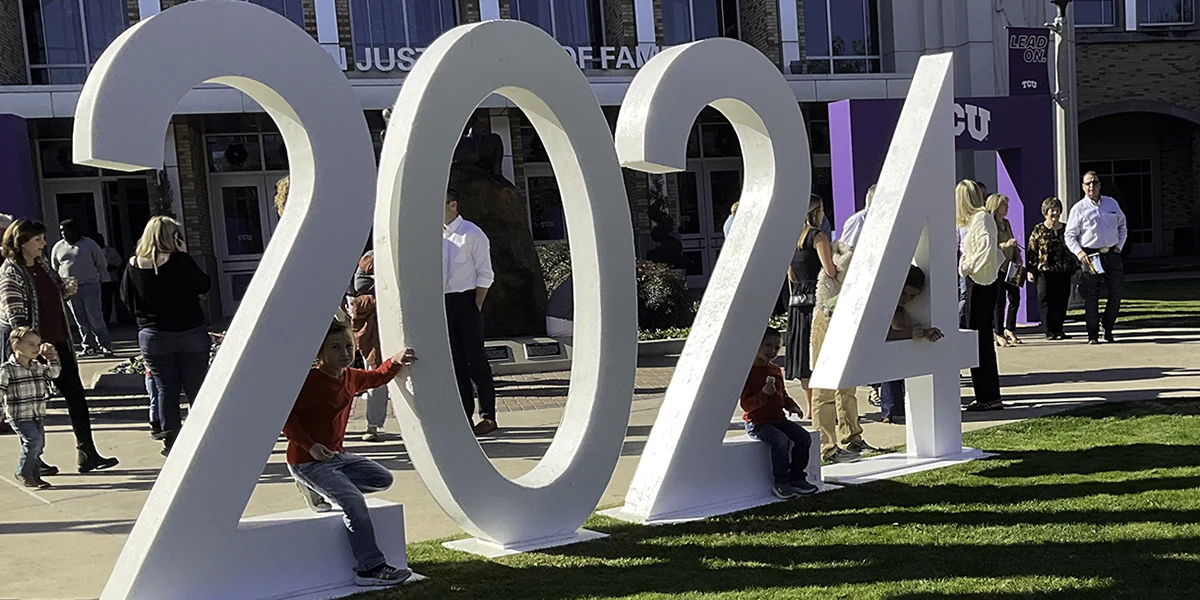 Giant 2024 sign on the lawn in front of Schollmaier Arena