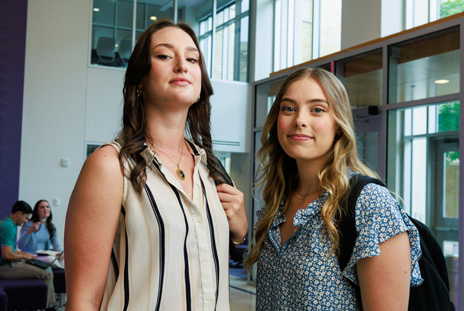 grad women in Rees Jones lobby