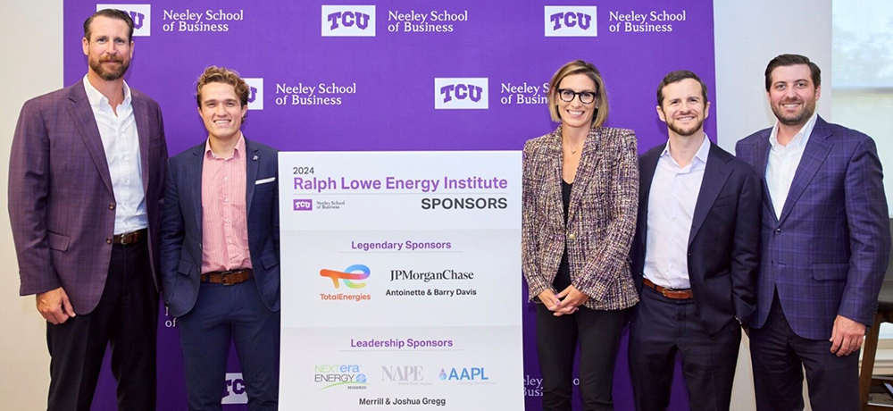 J.T. Aughinbaugh poses with keynote speaker and RLEI director Nikki Morris at the 2024 RLEI Energy Symposium