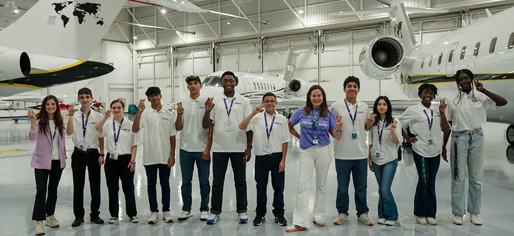 SCBiz Tech Camp group in hanger