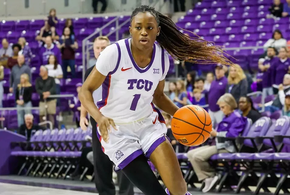 Tomi Taiwo works towards the paint during a TCU-Kansas basketball game
