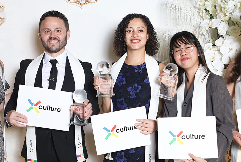 X Culture award winners display their trophies